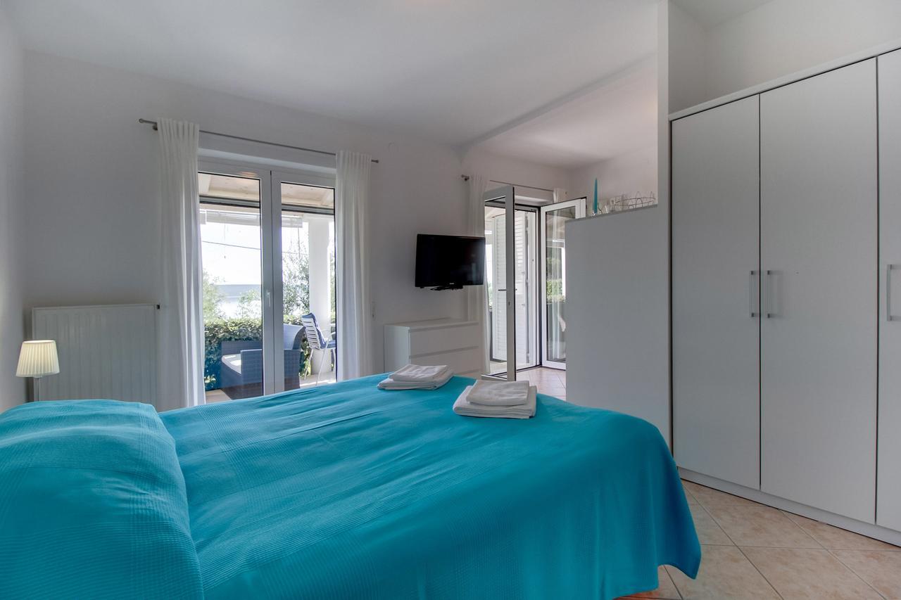 Apartments Del Sole Нерезине Номер фото